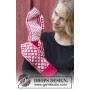 Christmas Magic Hands by DROPS Design - Knitted Mittens Pattern One-size