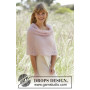 Candyfloss by DROPS Design - Knitted Poncho with fan edge Pattern size S - XXXL
