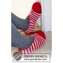 Candy Steps by DROPS Design - Knitted Christmas Slippers with Stripes Pattern size 29 - 46